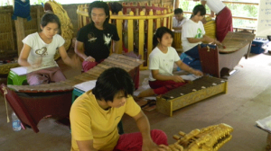 Mon students practicing the crocodile and xylophone.