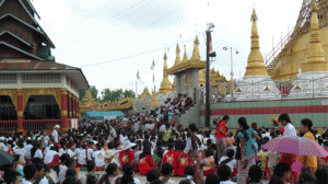 Hundreds of Mon people celebrate the crowning of the Kyaik Zel Pagoda in Kamarwat Village in Mudon Township (Photo; IMNA)
