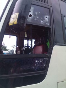  Front part of bus hit by bullets