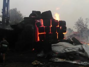 Timber logs remain ablaze (Photo: MNA)