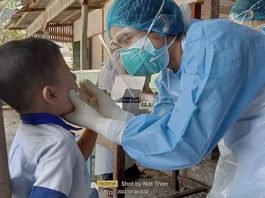 Photo : A preschool student is being tested for Covid infection (Natt Thar - Paung)